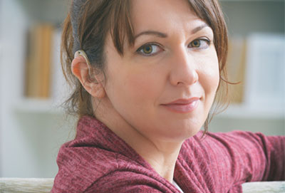 Woman wearing a hearing aid