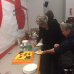 Cutting the cake on 99 years for Grace!