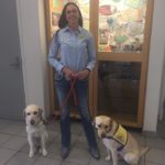 Melissa and two assistance dogs