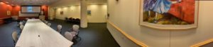 Entering the room.