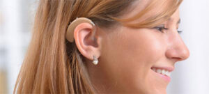 Woman wearing a hearing aid