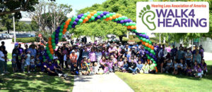 People celebrating at a Walk4Hearing