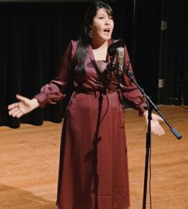 Kieko Kamiya performing "Speechless"