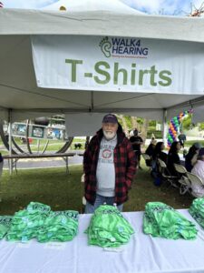 Chapter member Michael Thai handling the cool Walk4Hearing 2024 t-shirts