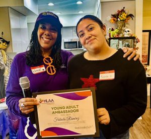 Wendi congratulating Fabiola for her Young Adult Ambassador award.