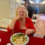 Cassandra enjoying the food.