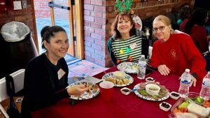 Laura, Teri, and Leslie enjoying the food