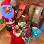 White elephant gifts laid out before the event