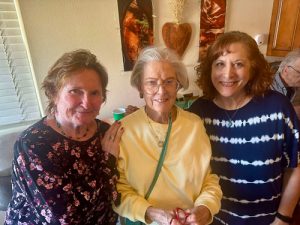 Sandy, Nanci, and Teri smiling to the camera