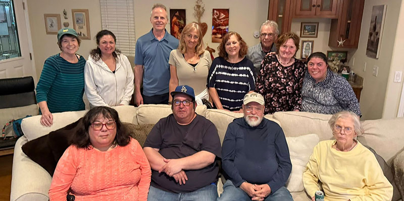 Group of Los Angeles chapter members posing during the Super Bowl party