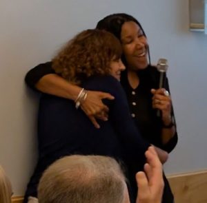 Wendi and Teri hugging as Teri become the new chapter president.