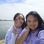 Fabiola Ramirez with her mom smiling along the coast.