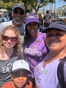 Walk4Hearing participants smiling at the camera